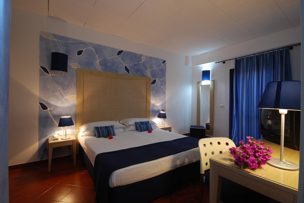 Cala Rosa Club Hotel Стинтино Номер фото